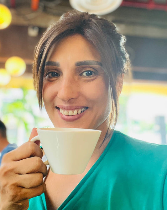 Lubna with a cup of tea